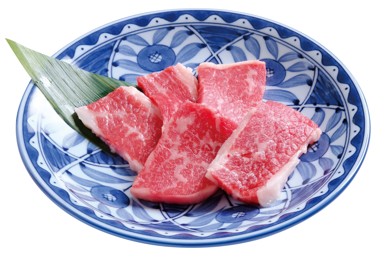 あみやき亭の店内で提供される焼肉ロースの盛り付け